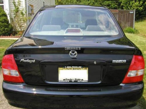 CHROME MAZDA LOGO EMBLEM (CURVE WITH FOOT EMBLEM) SIZE 70x60mm